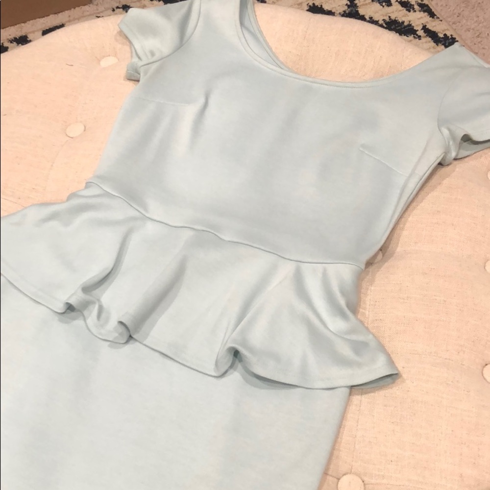 Mint colored soft peplum mini dress for spring - Picture 2 of 4